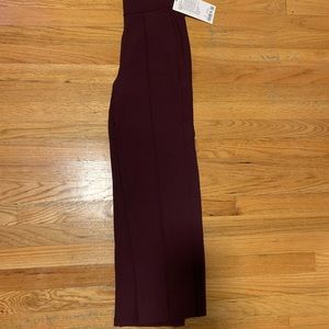 Never worn, new with tags Lululemon maroon Urban Stride pants. Dress up or down